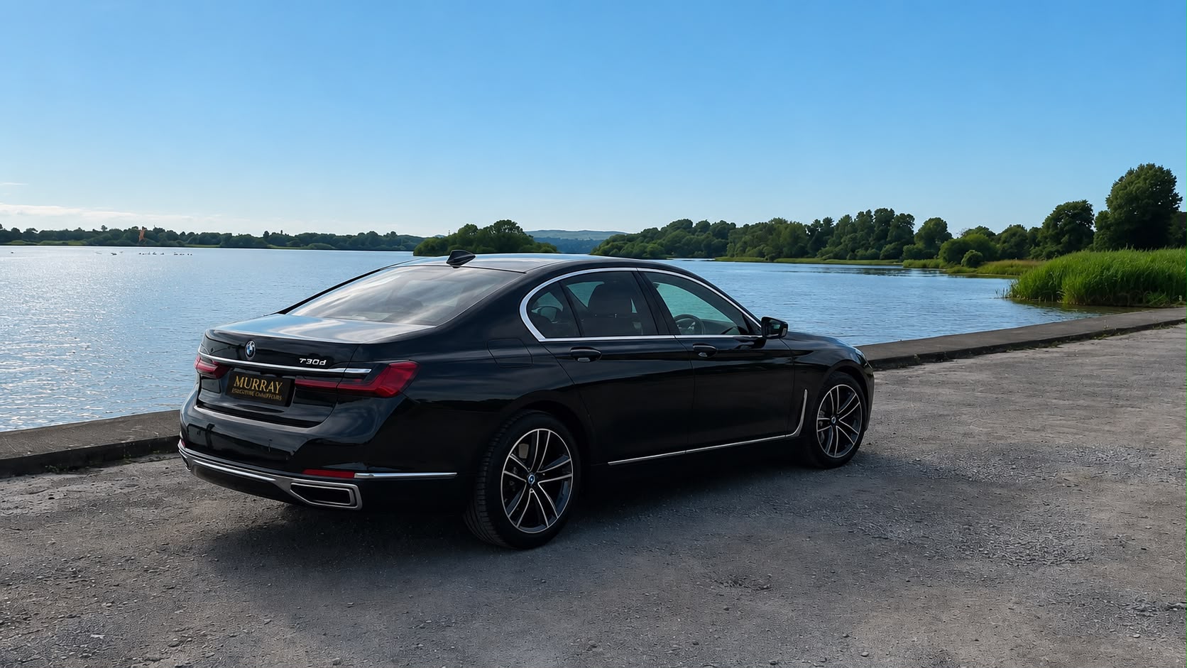 Murray Executive Chauffeurs BMW 7 Series by the water